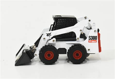 bobcat skid steer loader toy|toy skid loader with forks.